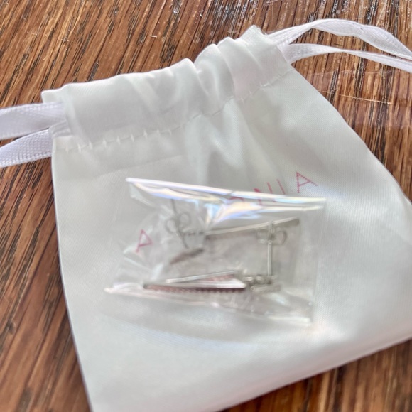 White Rhodium Plated Swarovski Crystal Accented Double Triangle Post Earrings. - Picture 3 of 3